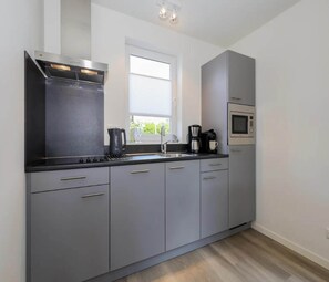 Fridge, microwave, dishwasher, coffee/tea maker