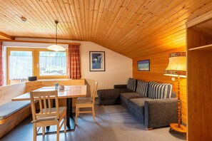 Apartamento luxo, 2 quartos | Sala de estar