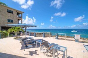 Terrace/patio - Modern Oceanfront 3 Bdr Condo /w Pool + Diving (West Bay)