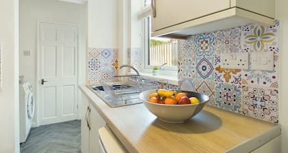 Welcome to Lily's Cottage - a three bedroom house sleeping up to five guests