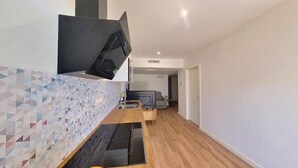 Private kitchen | Coffee/tea maker, fridge, microwave, electric kettle - Blue Apartment in Puerto del Rosario (Puerto del Rosario)