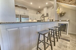 Fridge, microwave, stovetop, dishwasher - Luxurious Home Newly Remodeled Oceanfront Pool Steps to the Beach (Panama City Beach)