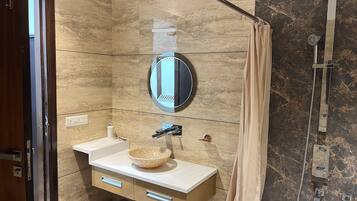 Shower, towels, soap, toilet paper
