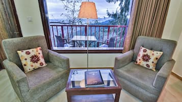 Superior Double Room, Mountain View | Laptop workspace, blackout drapes, iron/ironing board