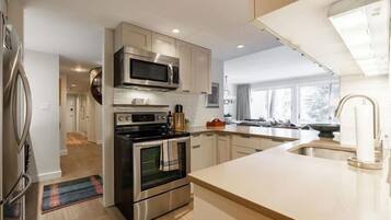 Condo, 2 Bedrooms | Private kitchen | Fridge, oven, coffee/tea maker, toaster