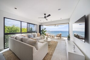 Appartement, 3 chambres | Aire de séjour | Téléviseur connecté