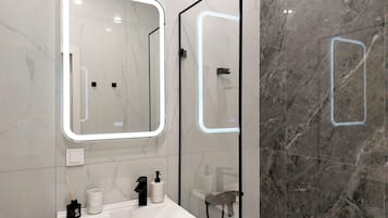 Hair dryer, towels, soap, toilet paper