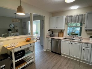 Fridge, microwave, oven, stovetop - Cozy home w/golf cart, lanai, smart TVs, & prime location near town squares! (The Villages)