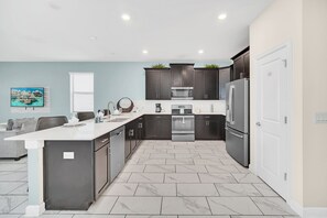 Fridge, microwave, oven, stovetop - Lakefront Luxury Retreat Private Pool & Movie Theater 367 (Kissimmee)