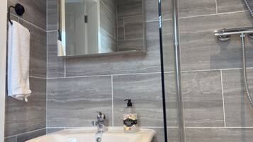 Hair dryer, towels, soap, shampoo