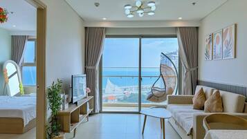 Apartamento, 3 quartos, vista para a praia | Área de estar