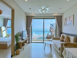 Apartment, 3 Bedrooms, Beach View | Living area | 45-inch Smart TV with digital channels
