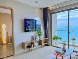 Apartment, 3 Bedrooms, Beach View | Living area | 45-inch Smart TV with digital channels