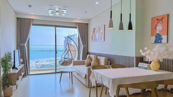 Apartment, 3 Bedrooms, Beach View | Living area
