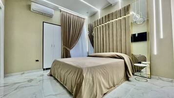 1 Schlafzimmer, BĂŒgeleisen/BĂŒgelbrett, WLAN, BettwĂ€sche