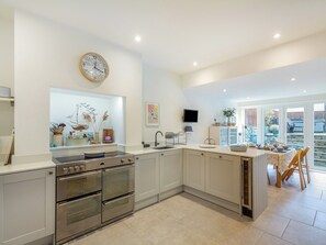 Dishwasher, high chair, cookware/dishes/utensils