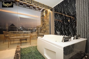 Deluxe Suite, Balcony | In-room safe, blackout drapes, iron/ironing board, free WiFi