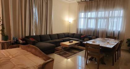 Cozy Family Room in Abu Dhabi with Bed Space and living Room Space