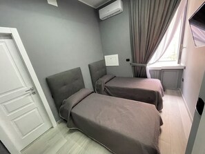 1 chambre, fer et planche à repasser, Wi-Fi, literie fournie