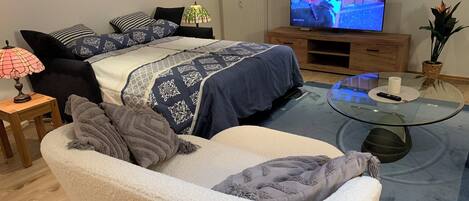 1 bedroom, desk, iron/ironing board, travel crib