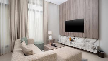 60-inch Smart TV with digital channels, pay films, streaming services