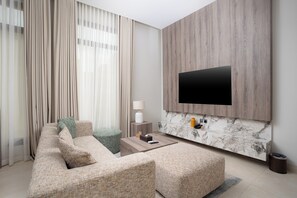 60-inch Smart TV with digital channels, pay films, streaming services
