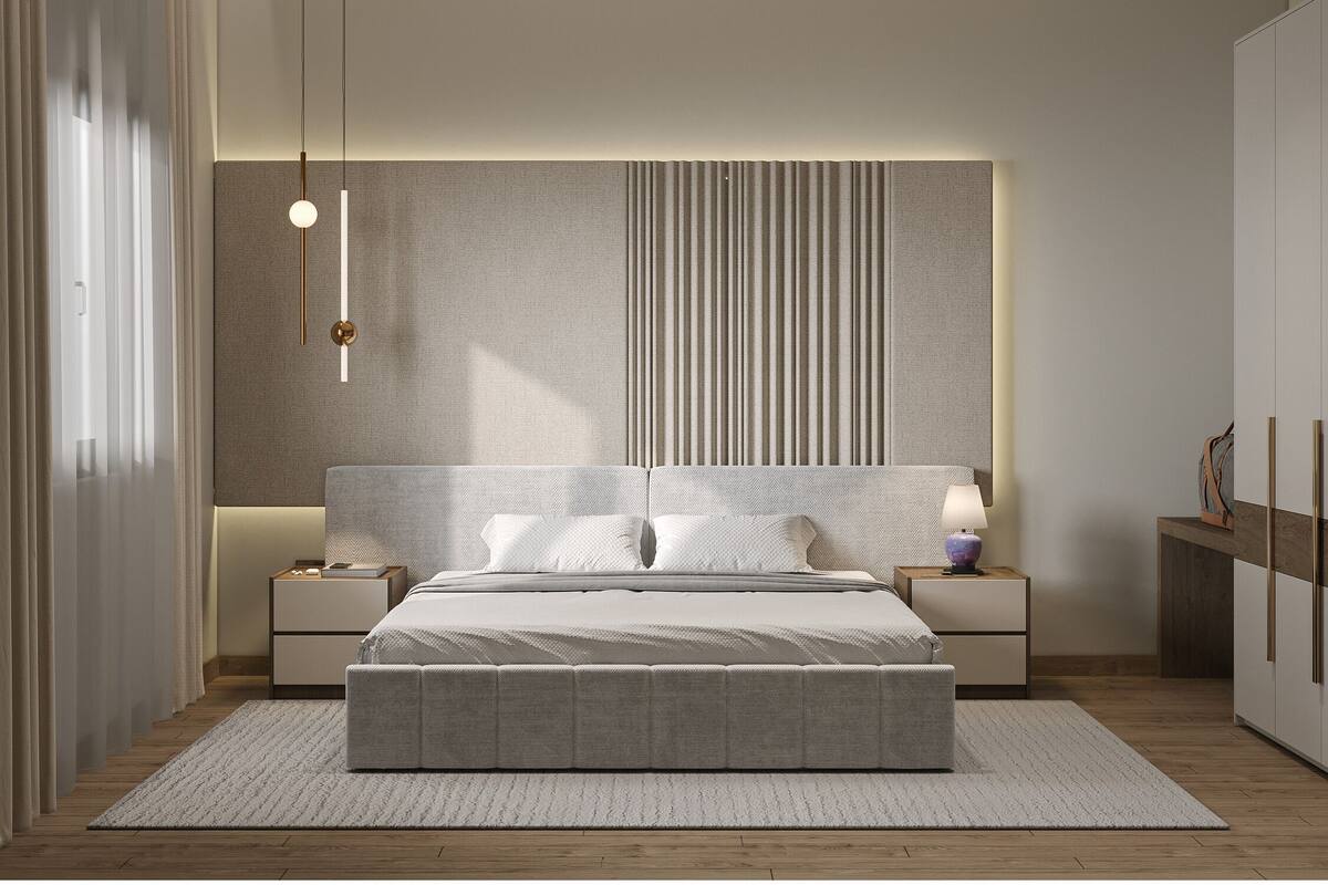A modern bedroom with a large bed, bedside tables, a wall-mounted light fixture, and a view of the outside.