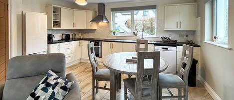 Dishwasher, high chair, cookware/dishes/utensils