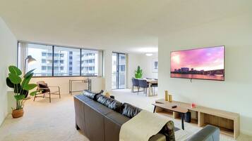 Apartment, Balcony, Garden View | Living area | 50-inch plasma TV with cable channels