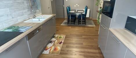 Fridge, microwave, stovetop, coffee/tea maker