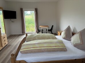 2 dormitorios, tabla de planchar con plancha, wifi y ropa de cama