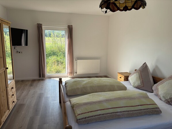 2 dormitorios, tabla de planchar con plancha, wifi y ropa de cama