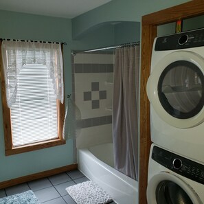 Hair dryer, towels, soap, shampoo
