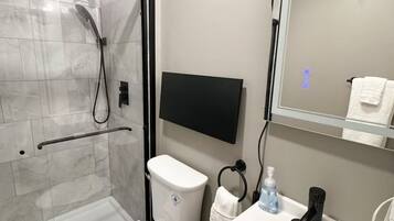 Shower, hair dryer, towels, soap