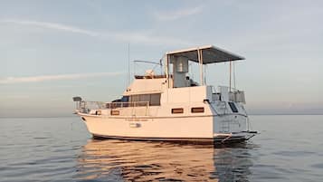 Huisje, uitzicht op baai | Terras