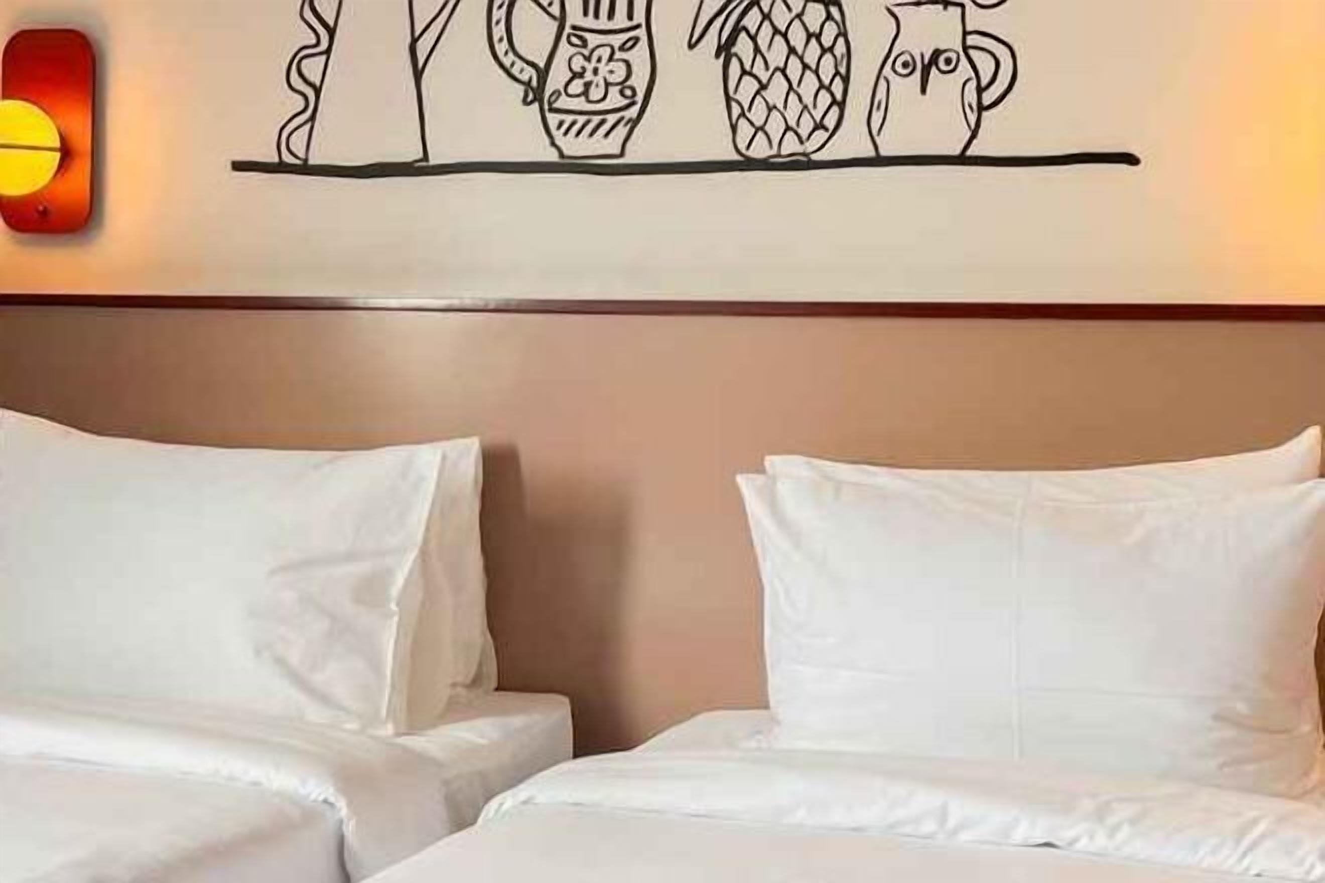 Premium bedding, desk, laptop workspace, blackout curtains