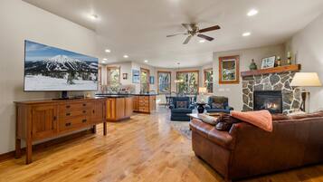 House, Multiple Beds, Patio, Garden View (Skyliner Summit Chalet) | Living area | 49-inch flat-screen TV with digital channels, fireplace