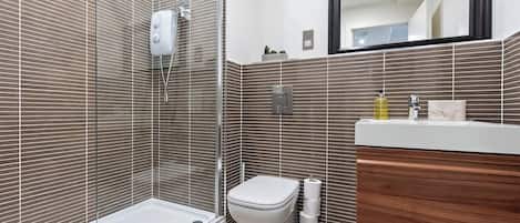 Hair dryer, towels, shampoo