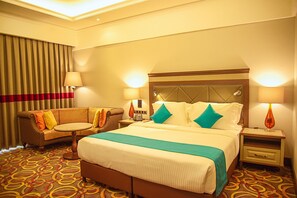 Deluxe-enkeltværelse | Minibar, pengeskab på værelset, individuelt design