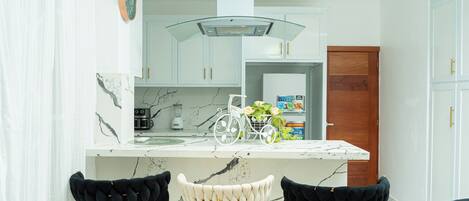 Deluxe Suite, 2 Bedrooms | Private kitchen | Fridge, microwave, stovetop, coffee/tea maker