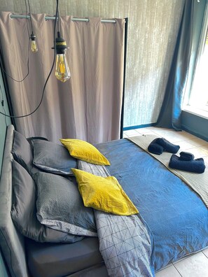 2 dormitorios, tabla de planchar con plancha, wifi y ropa de cama