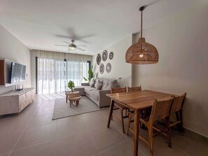 TV, offices - Perfect Beach Apartment steps from the water (Punta Cana)