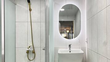 Hair dryer, towels, soap, toilet paper