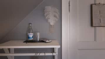 Basic Single Room | Blackout drapes, iron/ironing board, free WiFi, bed sheets