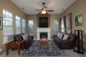 House, Multiple Beds, Patio, Garden View (The Old Mill Retreat) | Living area | 42-inch flat-screen TV with digital channels, fireplace