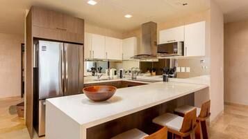 Fridge, coffee/tea maker, cookware/dishes/utensils