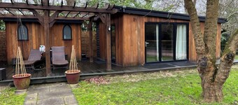 Retreat to a tranquil 30sqm Cedar wood cabin on a 3 acre country estate.