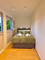 Apartment, 1 Double Bed, Non Smoking, Partial Sea View | 1 bedroom, soundproofing, iron/ironing board, free WiFi