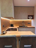 Apartment, 1 Double Bed, Non Smoking, Partial Sea View | Private kitchen