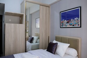 1 chambre, fer et planche à repasser, Wi-Fi, literie fournie